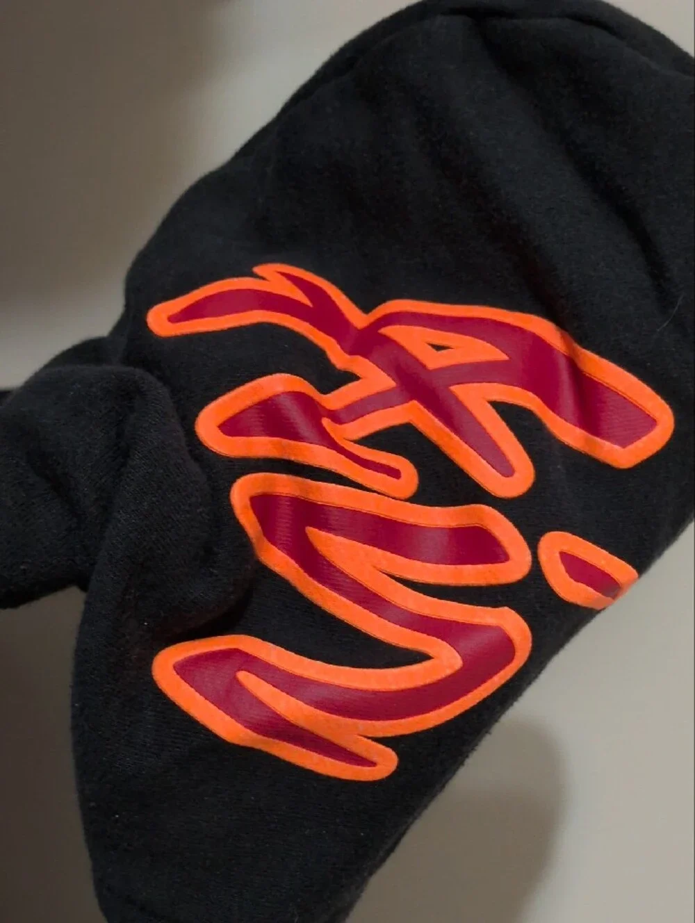Jordan Black Hooded Sweatshirt with Orange and Blue Logo